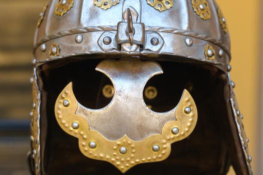 An ancient Knight's helmet with armor.A medieval concept.