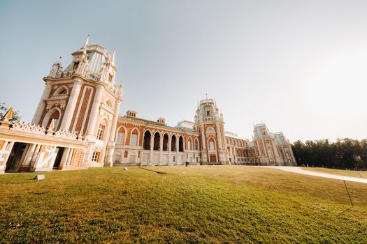 Grand Palace in Tsaritsyno in summer, Russia. Tsaritsyno Park is one of the main tourist attractions in Moscow. Beautiful scenic view of the old Tsaritsyn complex in summer.