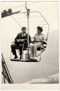 HUNGARY, 1970s: Retro photo of a marrital couple on a chair lift, 1970s.