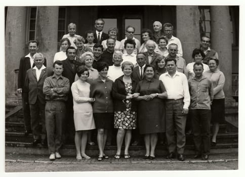 THE CZECHOSLOVAK SOCIALIST REPUBLIC, CIRCA 1970s: Vintage photo shows group of people in front of building, circa 1970s.