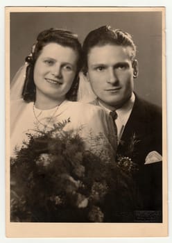 THE CZECHOSLOVAK SOCIALIST REPUBLIC, CIRCA 1955: A vintage photo shows wedding portrait of newly-weds, circa 1955.