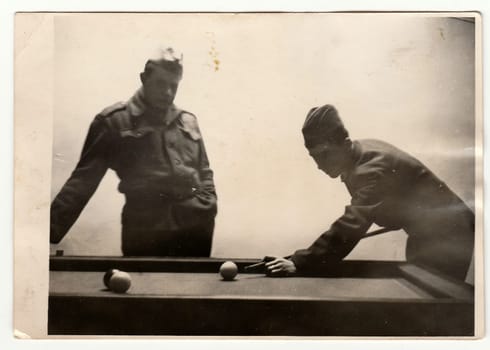 THE CZECHOSLOVAK SOCIALIST REPUBLIC, CIRCA 1965: A vintage photo shows soldiers play pool, circa 1965.