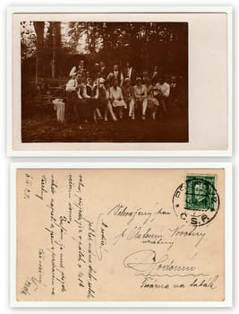 THE CZECHOSLOVAK REPUBLIC, CIRCA 1930s: Front and back of vintage photo. Vintage photo shows group of people in nature, circa 1930s