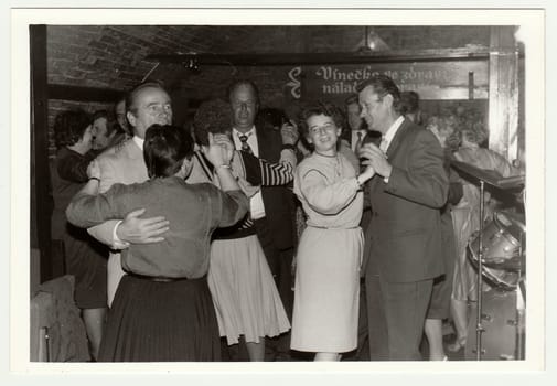 THE CZECHOSLOVAK SOCIALIST REPUBLIC, 1985: Vintage photo shows people dance in a wine bar.