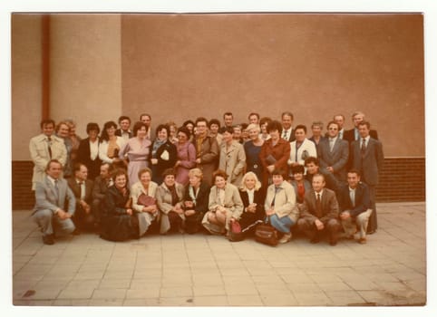 THE CZECHOSLOVAK SOCIALIST REPUBLIC - OCTOBER, 1985: Vintage photo shows group of people (former classmates) and their meeting after years.