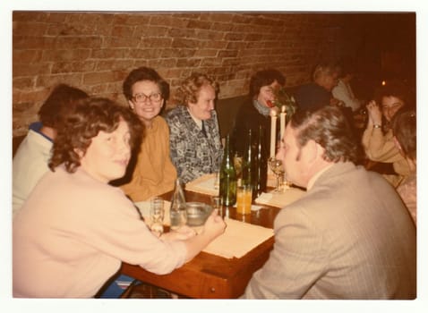 THE CZECHOSLOVAK SOCIALIST REPUBLIC, 1985: Vintage photo shows a group of people in a wine bar.