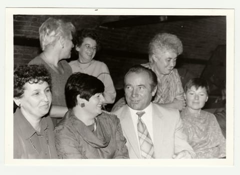 THE CZECHOSLOVAK SOCIALIST REPUBLIC, 1985: Vintage photo shows a group of people in a wine bar.