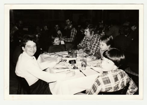 THE CZECHOSLOVAK SOCIALIST REPUBLIC, 1985: Vintage photo shows a group of people in the restaurant.