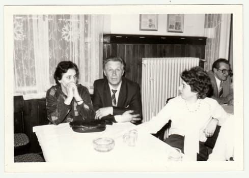 THE CZECHOSLOVAK SOCIALIST REPUBLIC, 1985: Vintage photo shows a group of people in the restaurant.