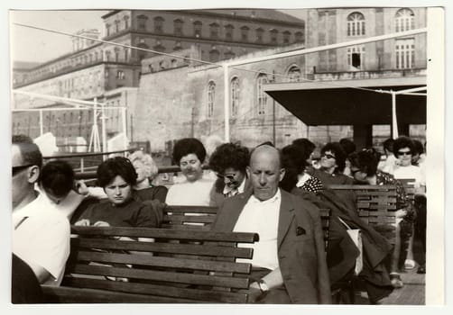 NAPLES, ITALY - MAY, 1969: Vintage photo shows people on vacation.