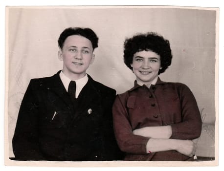 USSR - CIRCA 1970s: Vintage photo of a young couple with origin retouching (colored cheeks).