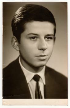 TEPLICE, THE CZECHOSLOVAK SOCIALIST REPUBLIC - CIRCA 1950s: Vintage portrait of very young man.