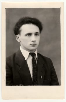 RYBINSK, USSR - CIRCA 1960s: Vintage portrait of a young man