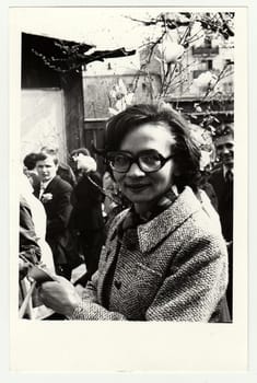 USSR - CIRCA 1970s: Vintage photo shows woman celebratting May Day (International Workers' Day).