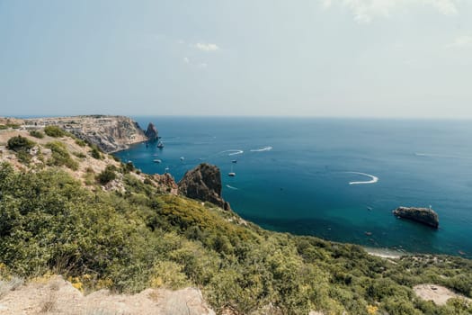 Aerial panoramic view of beautiful sunset above sea. Beautiful seascape. Sun glare, small waves on the water surface. Evening. Horizon. Nobody. No people. Copy space. Never-ending beauty of nature