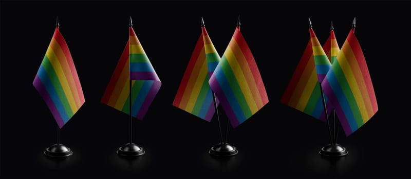 Small national flags of the lgbt on a black background.