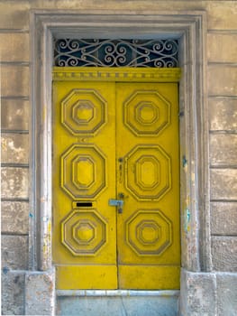 close up retro style old house door of Mediterranean architectural culture in Mediterranean island Malta. High quality photo