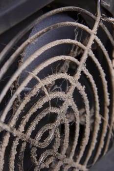 Dust on the fan in the computer close up