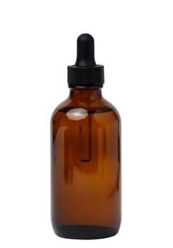 A glass brown bottle with a dropper on a white isolated background, a container for cosmetic products