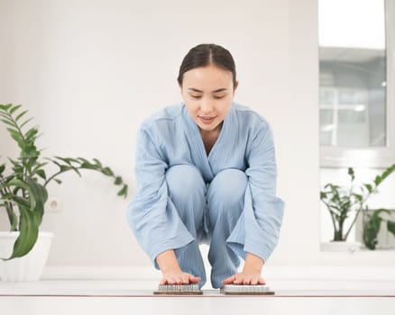 Asian woman folded her palms on sadhu boards