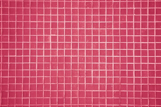 Ceramic tile close-up, texture and abstract background, concept of the year 2023 Viva Magenta. High quality photo