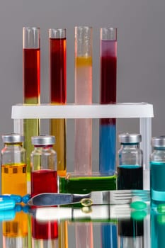 Test tubes and bottles with various colored liquids. Scientific lab medicine reserarch.