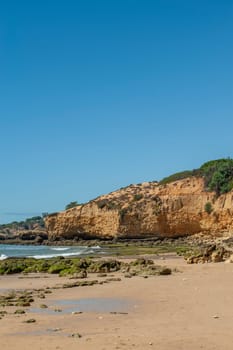 Maria Luisa beach with rock formation in Albufeira, Algarve, Portugal.