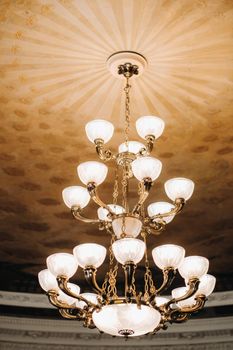 Antique crystal chandelier chandelier in the palace. Large chandelier in the castle.