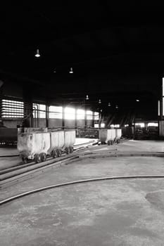 Coal lorries in a big hall in a mine in the Ruhr area, Germany