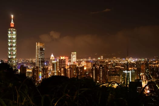 Skyline and Taipei 101 skyscraper in night Taipei, Taiwan