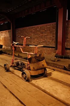 Vertical shot of an industrial trolley on the rail in Ruhr mine, Germany