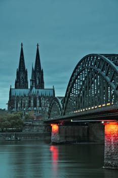 Cologne Cathedral and the Hohenzollern Bridge at dusk