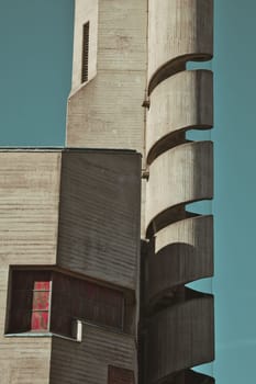 Christi Auferstehung church tower with spiral staircase on blue sky background in Cologne, Germany