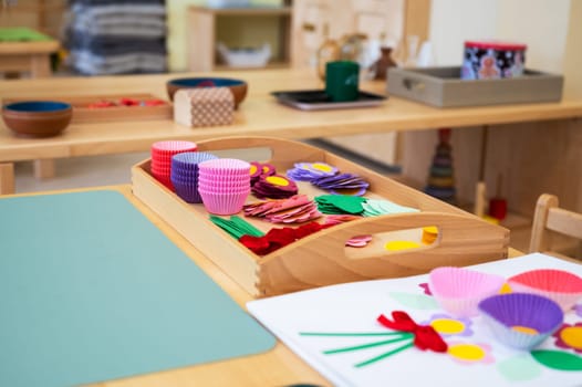Classroom of Montessori kindergarten. The colorful Montessori material. Concept of children learning toy