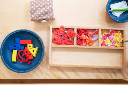 Classroom of Montessori kindergarten. The colorful Montessori material. Concept of children learning toy