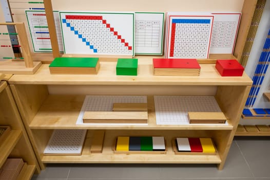 Classroom of Montessori kindergarten. The colorful Montessori material. Concept of children learning toy