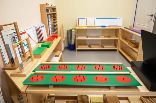 Classroom of Montessori kindergarten. The colorful Montessori material. Concept of children learning toy