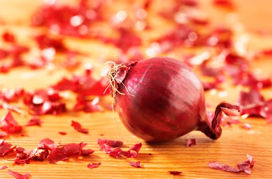 Fresh red onion in wooden table , agricultural occupation