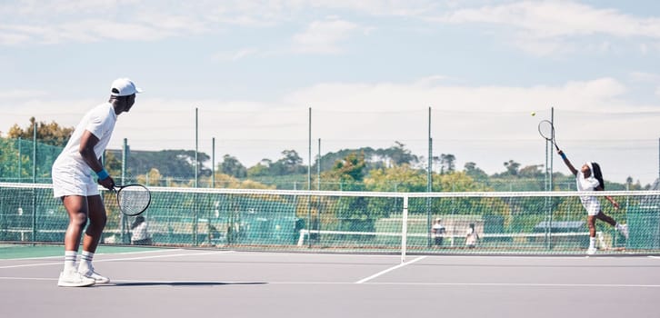 Fitness, tennis and people on tennis court, athlete playing game with focus and sport workout outdoor. Sports match, young man, woman and cardio while training and exercise together with teamwork.