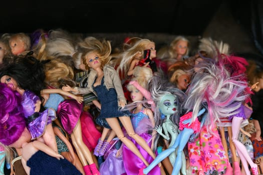 PARIS, FRANCE - NOVEMBER 19, 2022: The various of used fashion dolls Barbie, Ken, Shelly, Chelsea, Kelly, Bratz, Moxie My Scene Winx Witch