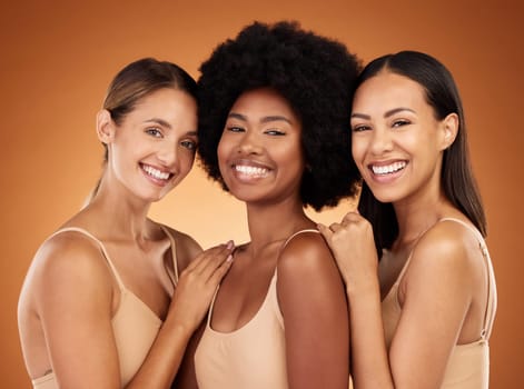 Natural, skincare and portrait of group of women to model beauty, cosmetics and makeup. Beauty products, diversity and multicultural girls with healthy skin, wellness and body care in brown studio.