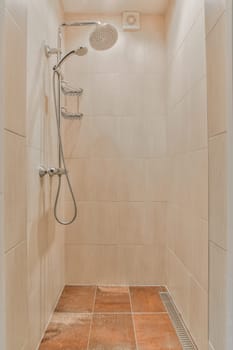 a shower with tile on the floor and tiled walls in an open space that looks like it's been done