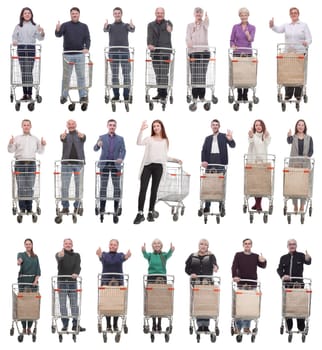 group of people with shopping cart showing thumbs up isolated on white background