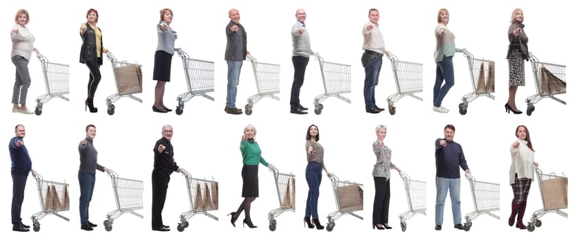 a group of people with a shopping cart point their finger at the camera on a white background
