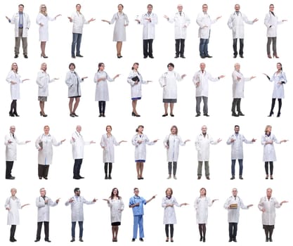 group of doctors in full length isolated on white background