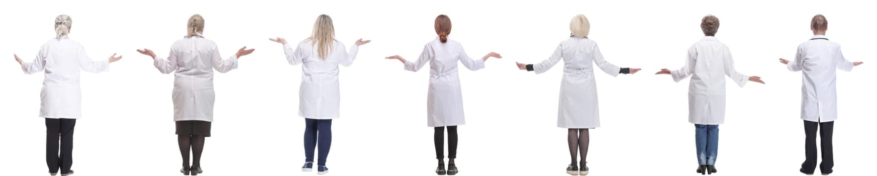 group of doctors standing with their backs isolated on white background