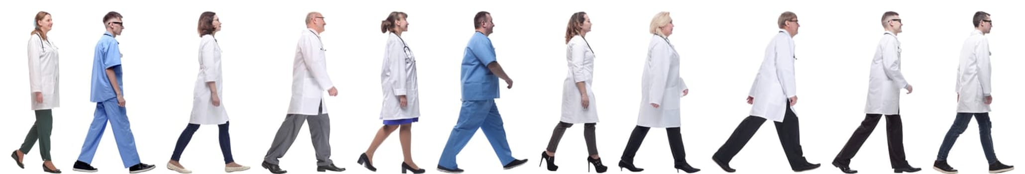 group of doctors in motion isolated on white background