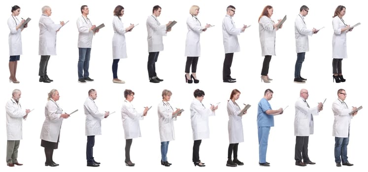 full length group of doctors with notepad isolated on white background