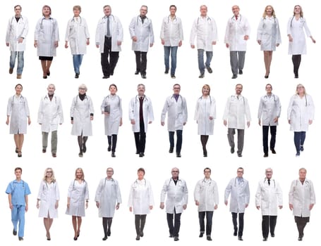 group of doctors in motion isolated on white background