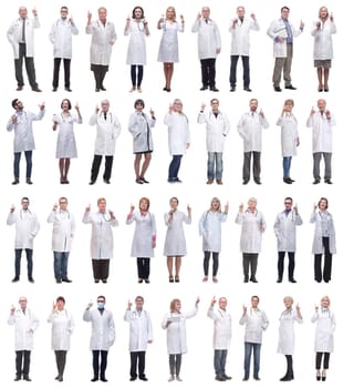 group of doctors in full length isolated on white background